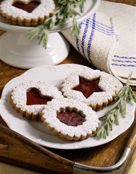 Traditional austrian manner is to spread thinly with jam, cover with a second cookie, then cover the top with chocolate frosting and a pecan or walnut half. Authentic Linzer Cookie (Helle Linzer Plaetzchen) Recipe From Austria in 2019 | Cookie recipes ...