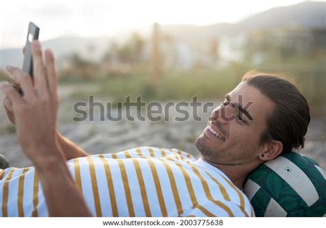 Handsome Guy Chilling Beach Young Man Stock Photo 2003775638 Shutterstock
