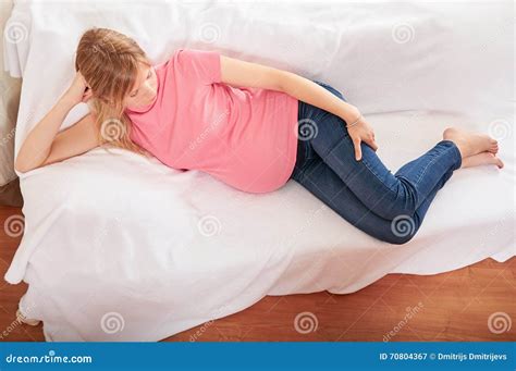 Pregnant Woman Relaxing At Home On The Couch Stock Image Image Of Motherhood Healthy 70804367
