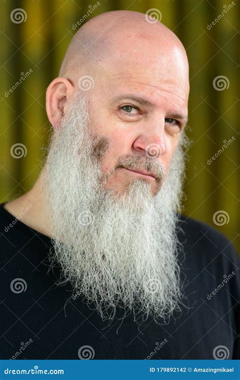 Face Of Mature Handsome Bald Man With Long Beard Outdoors Stock Photo