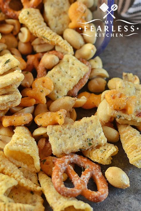 This snack mix recipe is perfect for game day (tailgating), the super bowl or just a quick and easy snack! Quick and Easy Ranch Snack Mix - My Fearless Kitchen
