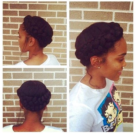 After attaching two packs of kanekalon braiding hair to her natural ponytail, she wraps her natural hair around as a base for the long pony. Halo braid, Relaxed hair and Protective styles on Pinterest