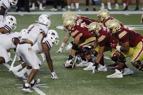 A football team consists of 11 players. Boston College says football team is following COVID ...