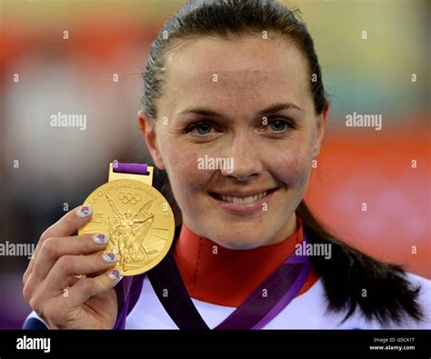 Great Britain S Victoria Pendleton Celebrates With Her Gold Medal After