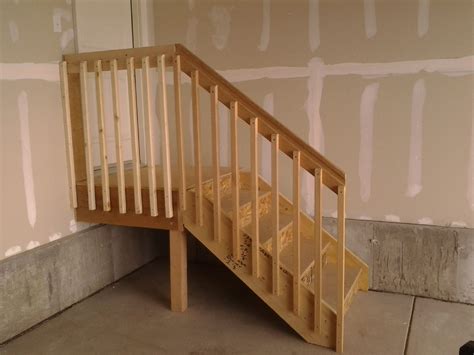 Stylish And Functional Garage Stairs With Landing
