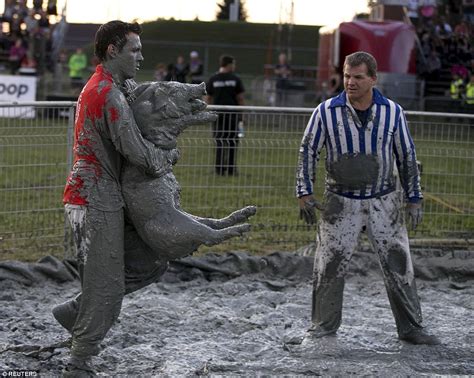 Festival Du Cochon In Canada Where You Catch Greased Pigs To Toss In