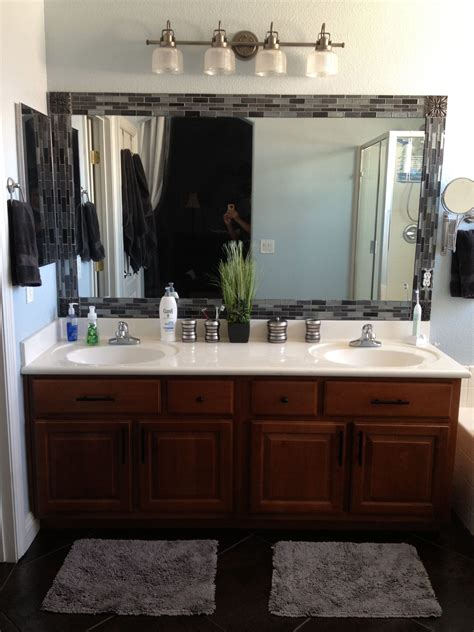 At mirrorchic our goal is to provide you the best quality, affordable custom bathroom mirror frames for bathroom remodels and upgrades as well as new construction. Thanks to ideas from Pinterest we tiled our bathroom ...