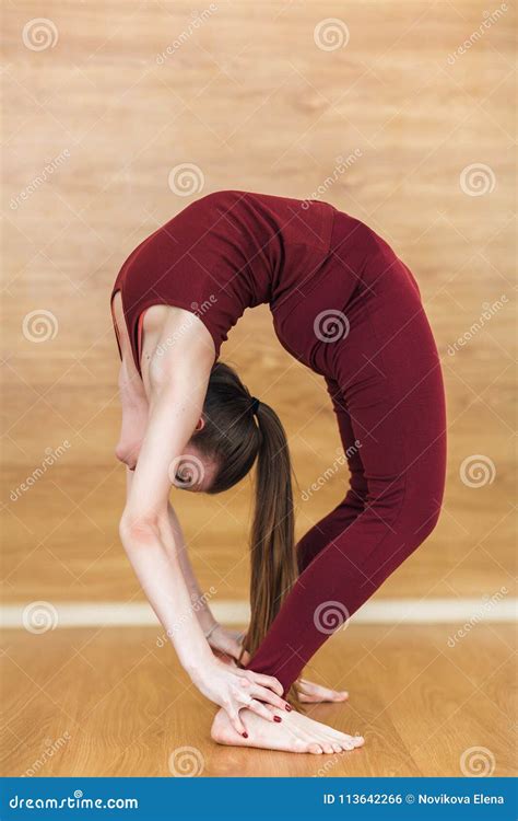 Backbend Yoga Gymnastics Woman Acrobat In An Inclined Pose Girl