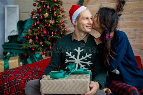 romantic couple in love happy about celebrating winter holidays together in good mood stock