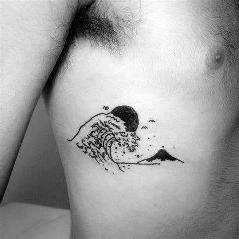 Rib tattoos are worth the pain, and they are extremely aesthetically pleasing. 30 Simple Small Rib Cage Tattoos for Men and Women ...