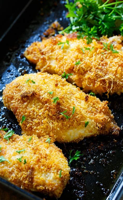 Breaded chicken cutlets are baked, not fried yet the chicken is so moist and full of flavor. Baked Parmesan Chicken - Spicy Southern Kitchen
