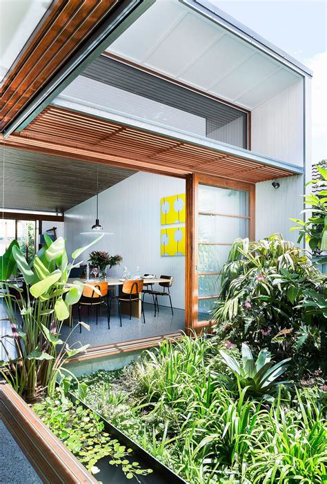 Beach and mediterranean style home floor plans feature courtyard, open layout, indoor & outdoor living with attached bedroom and bath separate from the main house, or a. Gallery - Dianne and David's Small House Success (With images) | Indoor courtyard, Courtyard ...