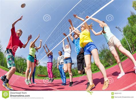 It is not intended for promotion any illegal things. Fisheye View Of Teens Playing Volleyball On Ground Stock ...