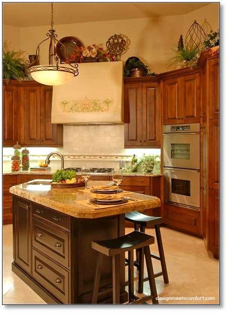 Luckily, it is a great place to store or display items. How do I decorate above my kitchen cabinets? | Decorating ...