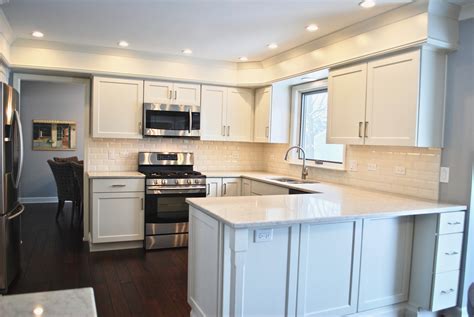 Replacing the fascias on a bungalow does not require scaffolding, so you could save. Geneva Kitchen Remodel with Off White Cabinetry & Quartz ...