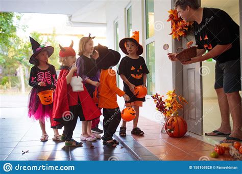 Kids Trick Or Treat Halloween Child At Door Stock Photo Image Of