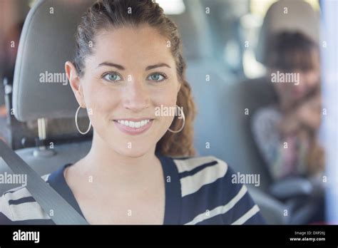 Portrait Of Smiling Woman Inside Car Stock Photo Alamy