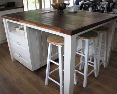 Great storage and seating patricia this was a bit of a challenge to put together for two women, but we did it! 4 Person Kitchen Island | Photo Gallery of the Benefits of ...