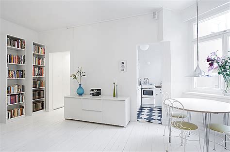 The tiny house movement isn't necessarily about sacrifice. Clean White Small Apartment Interior Design with ...
