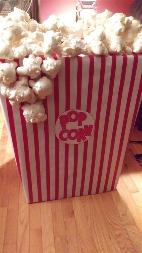The Popcorn Bag Is Full Of White Popcorn