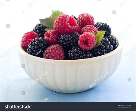 Assorted Berries In Bowl On Natural Background Selective Focus Stock