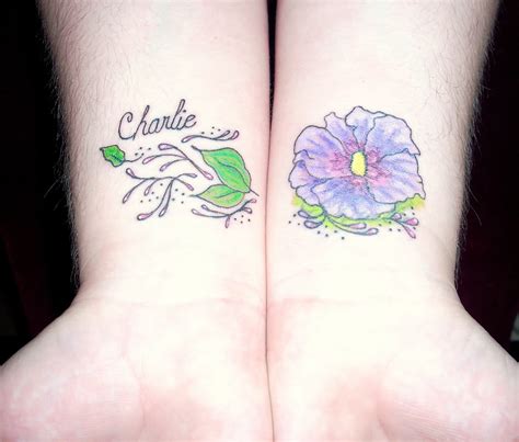 Small rose tattoo on wrist is cover up with a big heart and rose flower tattoo. 69 Attractive Wrist Tattoo Designs - Mens Craze