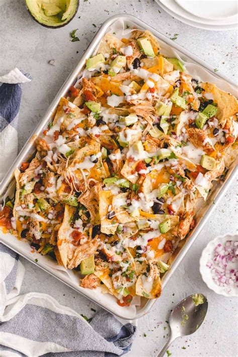 Serve homemade chicken nachos recipe as part of a mexican meal that includes, mexican black bean corn soup recipe and baked mexican rice recipe followed by a dessert of apple enchilada recipe. The Best Lighter Chicken Nachos (396 calories or 8 WW points!)