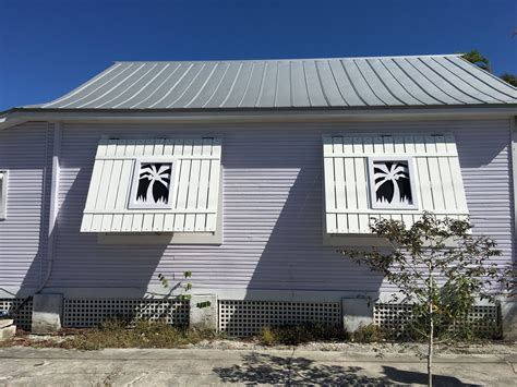 Key west is an island and city of the same name in the united states, part of the florida keys archipelago. Purple conch house, white palm tree shutters. | Conch ...