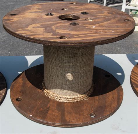 Small Wooden Stained Spool With Burlap And Rope Finishings Wooden