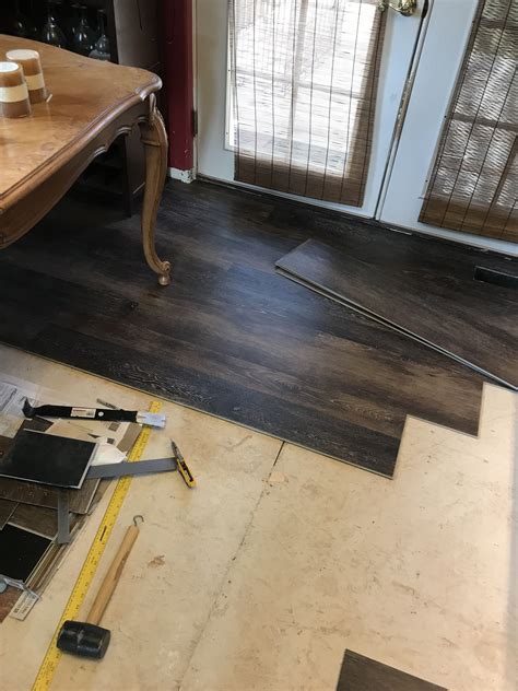 Lifeproof flooring- Texas Oak Different width boards make it look like