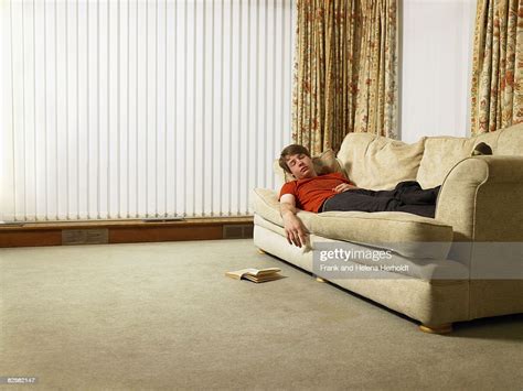 Man Sleeping On Sofa Photo Getty Images