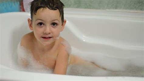 It took her breath away at first. Little Boy Washes Himself in Bath 01 by OlympiaT | VideoHive