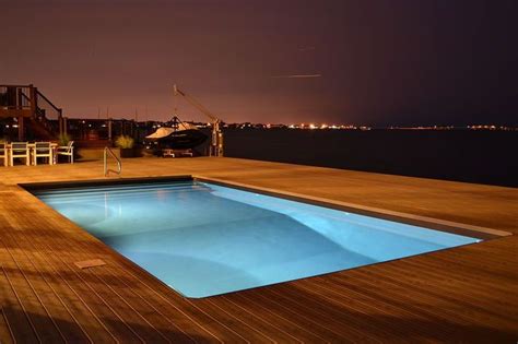 The area that surrounds your swimming pool is called a pool deck. For this very special pool and spa (unseen) surround, we ...