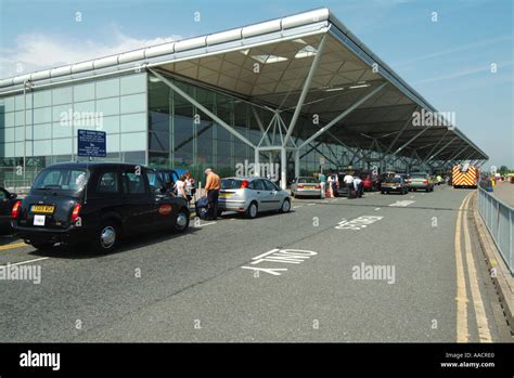London Stansted Airport Passenger Terminal And Busy Car Drop Off Area At