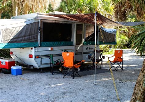 Pop up campers fold down small and make a great camping companion. Because I'm Me | Camper awnings, Diy awning, Popup camper