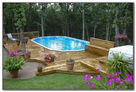 Above ground, pools can look just as elegant and add interest to your landscaping as well. Oval Swimming Pools with Decks 13 (With images) | Above ...