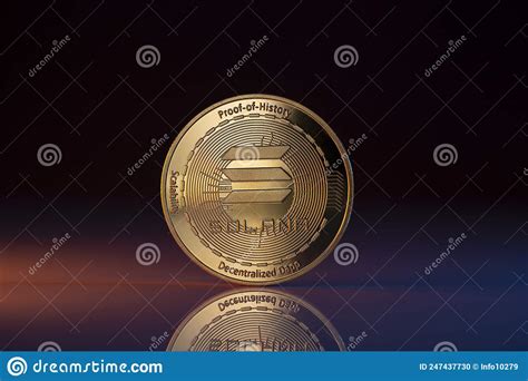 Solana Sol Crypto Coin Placed On Reflective Surface And Lit With Purple And Red Lights Stock