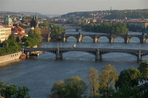 A river begins on high ground or in hills or mountains and flows down from the high ground to the lower. Vltava river - Prague.eu