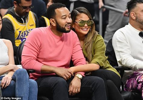 John Legend And Wife Chrissy Teigen A Share Kiss At Basketball Game