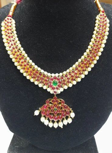 Gold Plated Golden Panchalogam Kemp Stone And White Pearls Necklace At