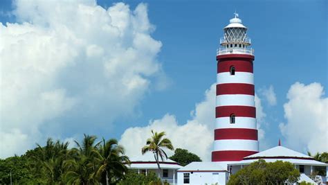 Beautiful Tropical Island Lighthouse With Luxury Passing Craft On A