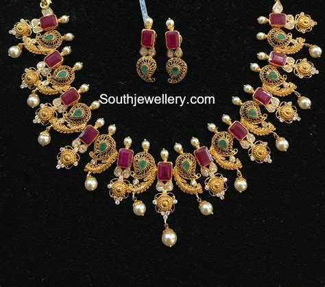 22 Carat Gold Necklace Adorned With Rubies Emeralds And South Sea