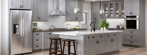 Your options for countertop materials are nearly endless because gray works as a neutral hue gray cabinets also work with any wood tone, so you can choose stained mahogany cabinets for the island, for example, and a cement. Denver Cabinet Express Brown Gray Color Pallete With Lowes Kitchen Cabinets Prefinished ...