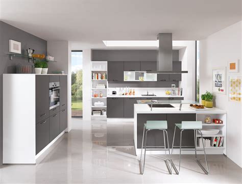 Slate blue cabinets in kitchen with orange accents. i-Home Kitchens - Nobilia Kitchens & German Kitchens ...