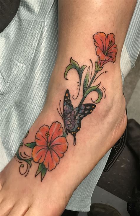 Maybe you would like to learn more about one of these? Hibiscus and butterfly color tattoo | Color tattoo, Tattoos, Tattoo work