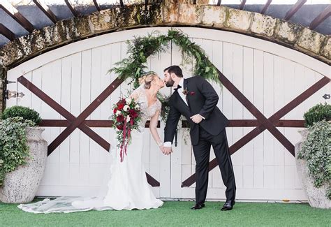 13 romantic ranunculus wedding bouquets. A cascading bridal bouquet in burgundy and ivory with ...
