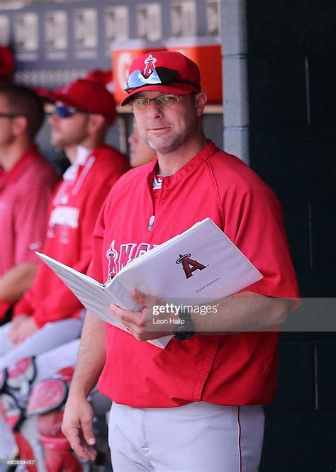 Los Angeles Angels Of Anaheim Hitting Coach Dave Hansen Watches The News Photo Getty Images