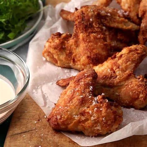 Butter the cut sides of the burger buns, then toast on the hot skillet until browned and crisp. Our Buttermilk Fried Chicken Wings just might be the best ...