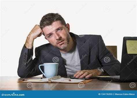 Frustrated Man Working At Office Computer Desk Desperate And