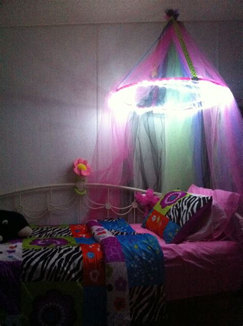 Remodelaholic camping tent bed in a kid s woodland bedroom. DIY kids bed canopy with lights. | Canopy bed diy, Diy kids bed, Bed canopy with lights